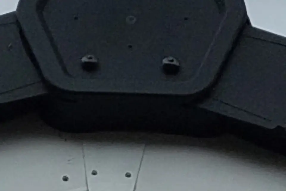 Close-up of a gutter outlet and joint