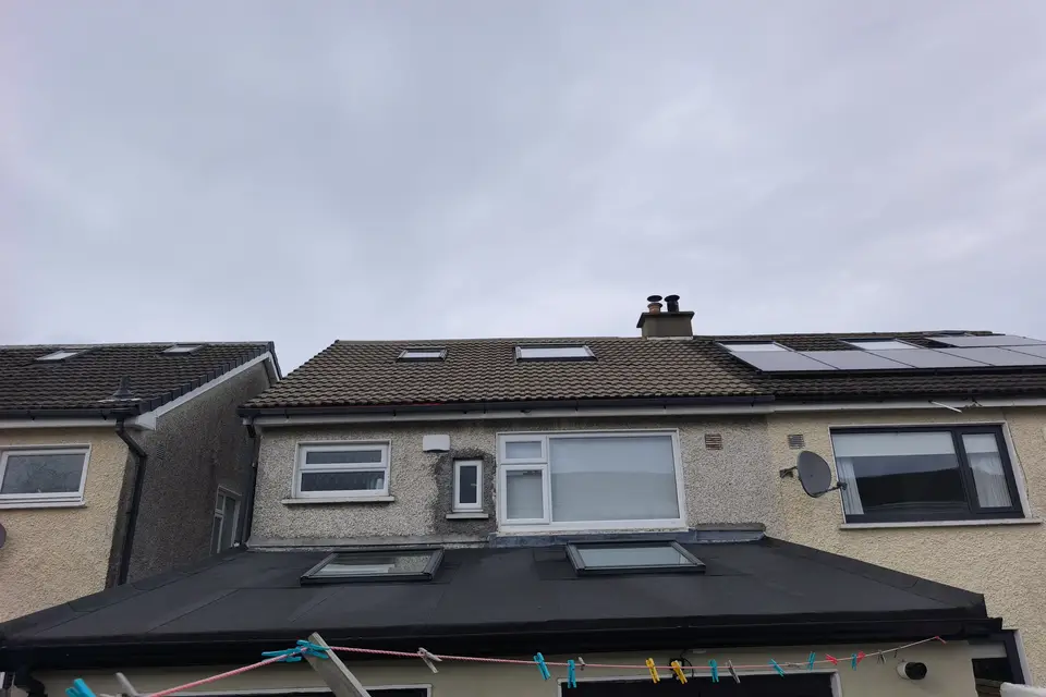 Rear extension roof with roof windows on a semi-detached house